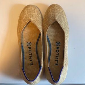 Rothy’s gold safari flats